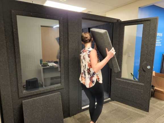 Clarice Myers assembles a sound booth