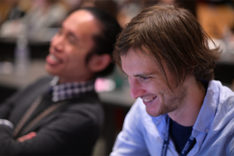 Photo of two students sitting in class