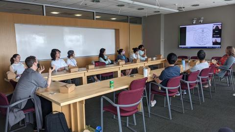 Carrie Nieman leads an informal seminar for students and staff